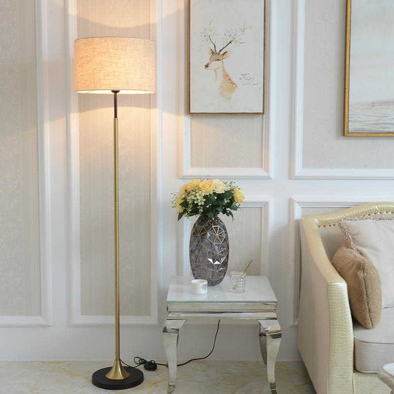 Modern Gold And Black Floor Lamp with Off-White Fabric Shade
